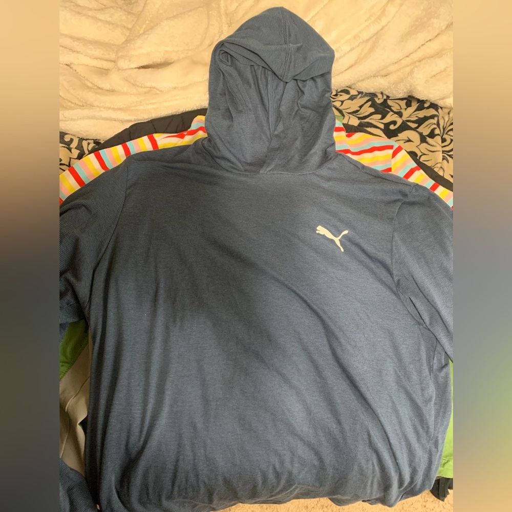 I am selling my long sleeve puma shirt with a hoodie has been worn maybe once